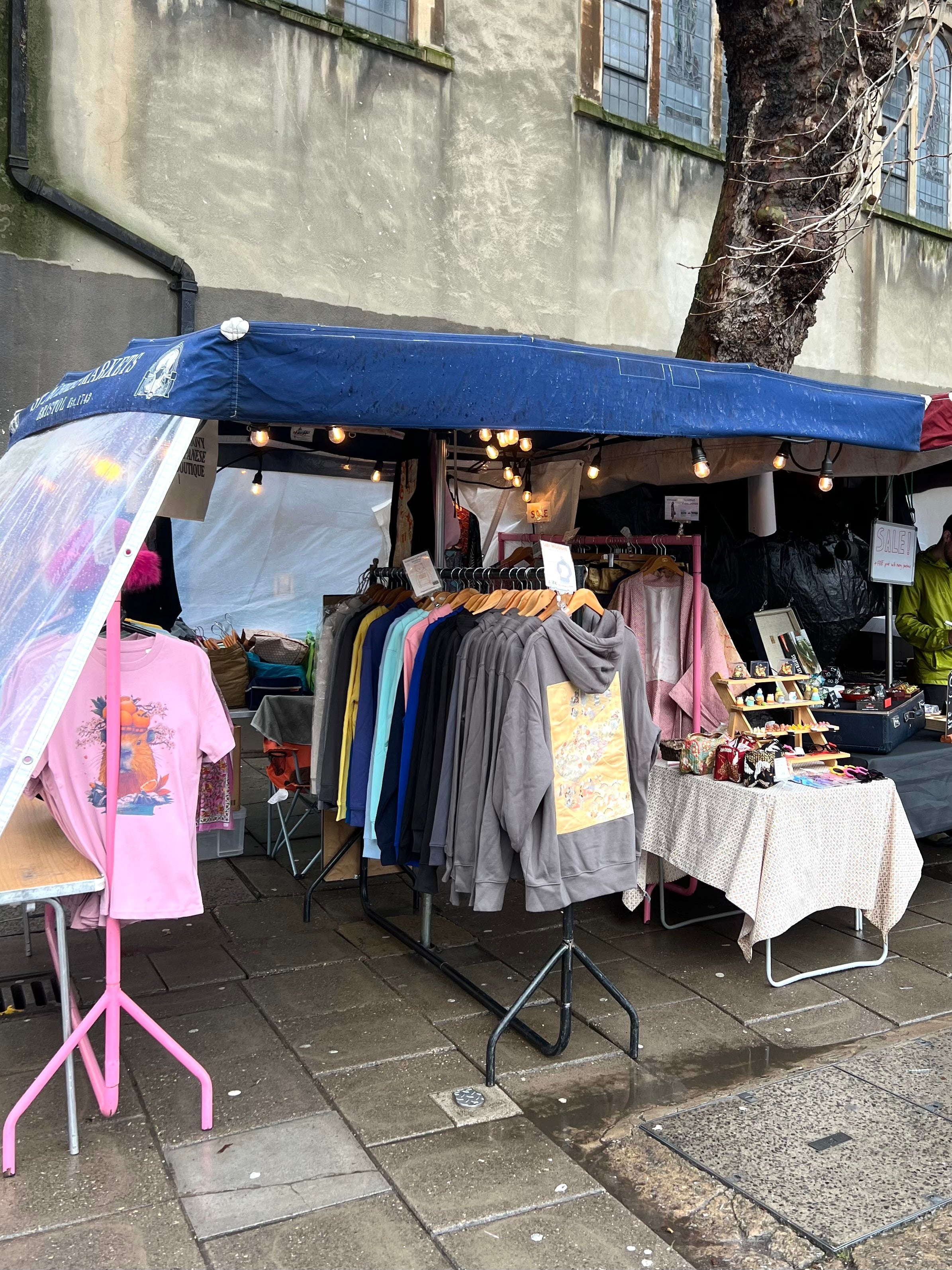 A Cold, Rainy Day at St Nicholas Market — and a Meaningful Encounter