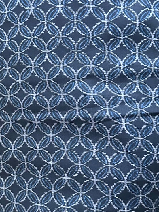 Japanese Shippo pattern fabric in navy blue prepared for garment production