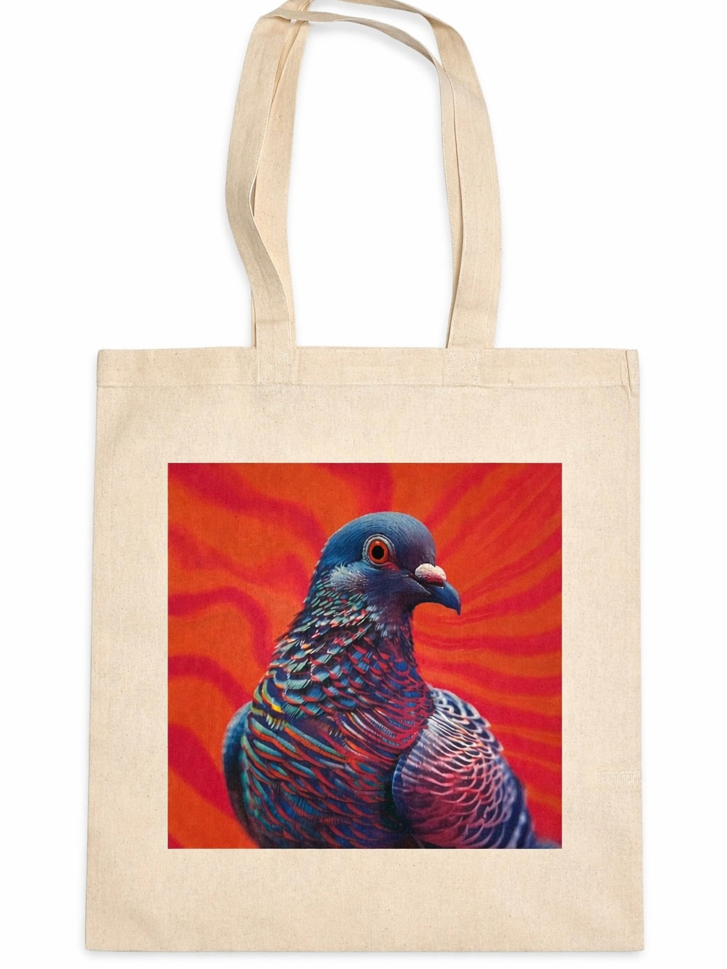 Natural canvas tote bag featuring a bold contemporary pigeon illustration in iridescent blue and purple tones against a vivid red background, photographed on a clean white backdrop.