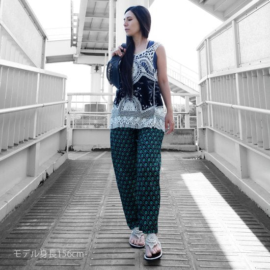 Peacock pattern trousers