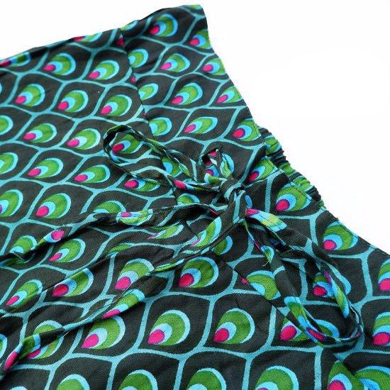 Peacock pattern trousers