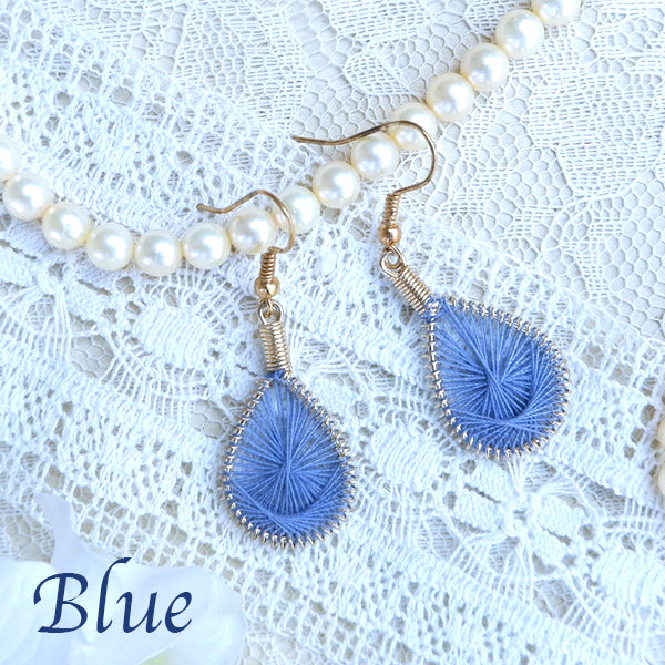 One color mandala design threaded earrings.