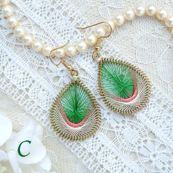 Two color Mandala design threaded earrings.