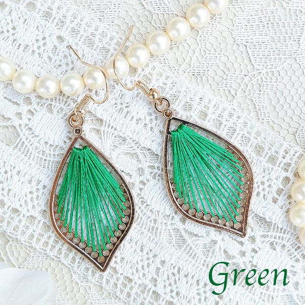 One color mandala design threaded earrings.